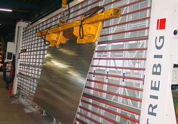 Vacuum lifter of Aerolift which is used to load a vertical sawing table